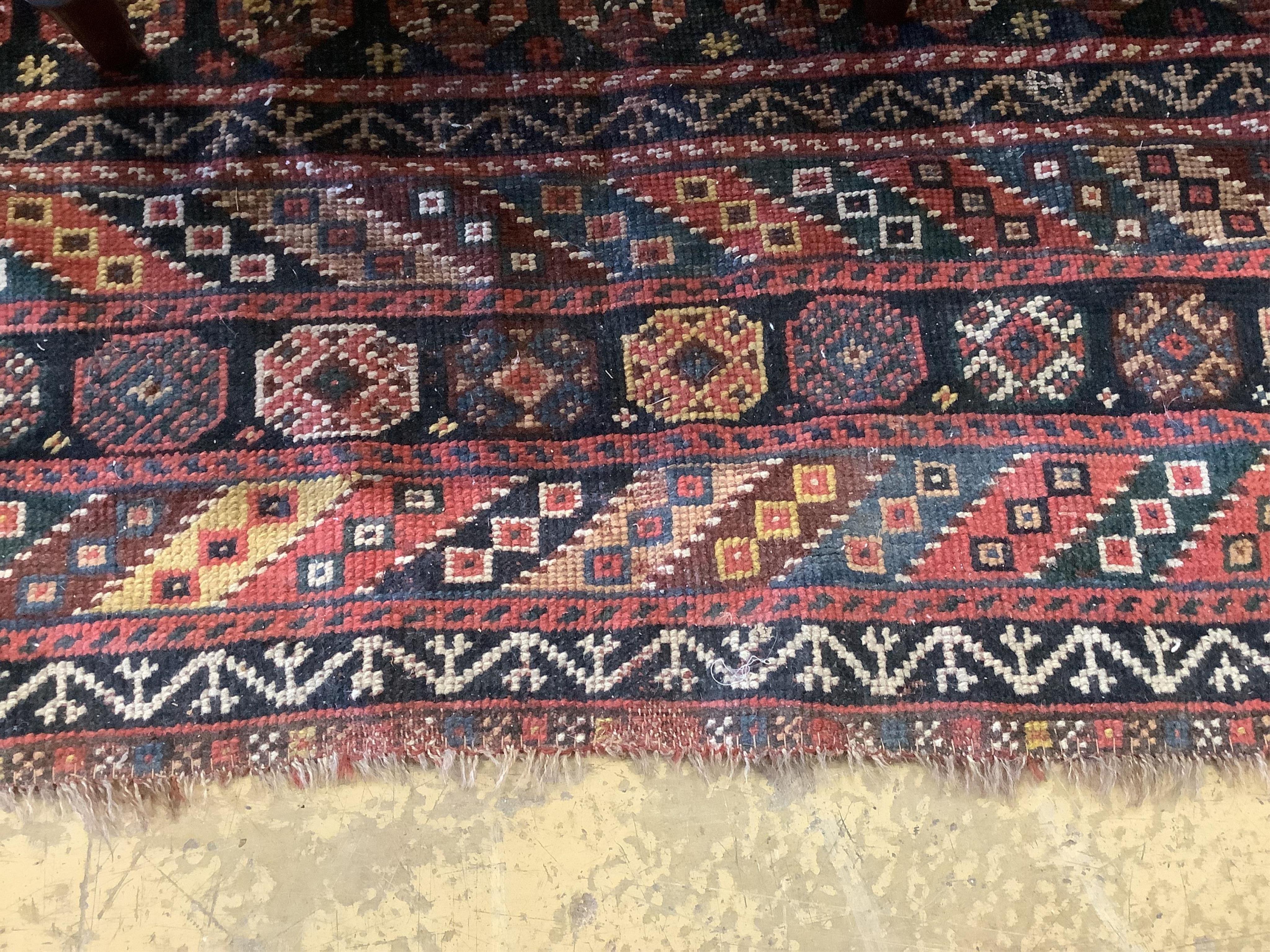 An antique Shirvan blue ground Boteh carpet, 290 x 170cm. Condition - fair